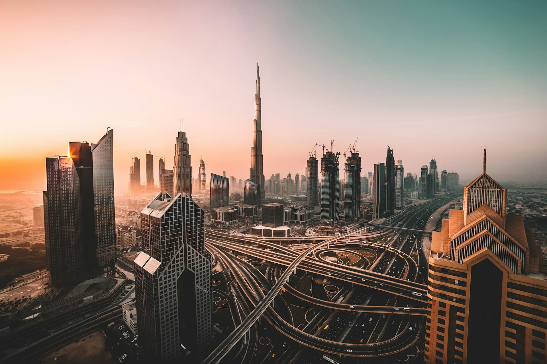 Abu Dhabi skyline at dusk — modern towers along the corniche